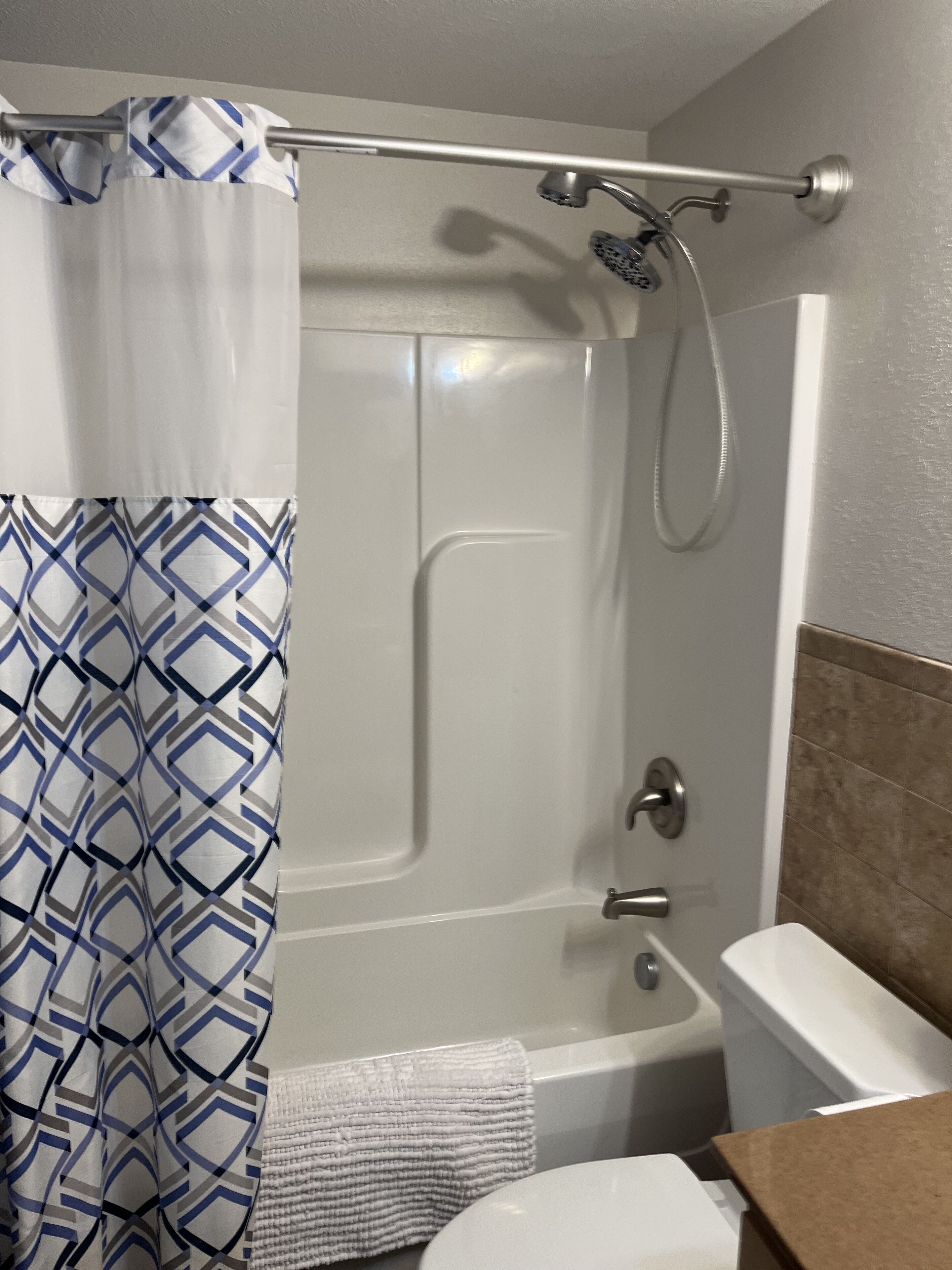 Combined shower/tub