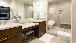 A modern bathroom with two sinks, a large mirror, and a walk-in shower. - Sterling Studio Hotel Room by RedAwning (Park City)