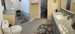 Combined shower/tub, hair dryer, towels, soap