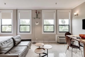 Living area with palm view windows