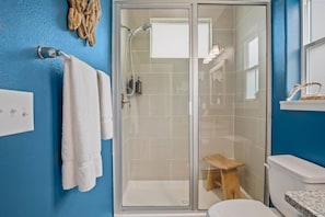 Combined shower/tub, hair dryer, towels - Enjoy Poolside Perks in This Charming Home, Just Minutes from Town (Port Aransas)