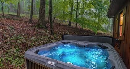 River Cabin w/ Hot Tub, Screened Porch & Fire Pit