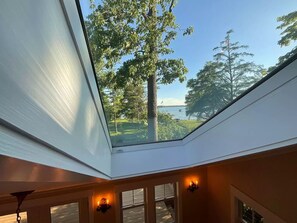 Enjoy a serene view of the lush landscape from the room's skylight.