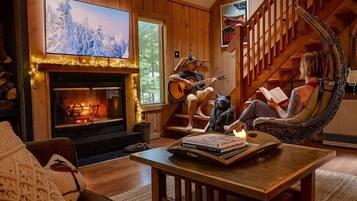 TV, fireplace, books, stereo