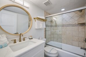 Bathtub, hair dryer, towels