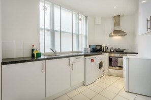 Premium Apartments | Cozinha privada | Geladeira, micro-ondas, chaleira elétrica, torradeira