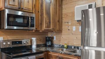 Réfrigérateur, micro-ondes, plaque de cuisson, cafetiÚre/bouilloire