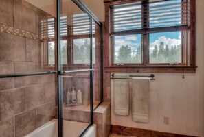 Bathtub, hair dryer, towels