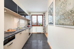 Studio, Balcony | Private kitchen | Dishwasher, coffee/tea maker, cookware/dishes/utensils - Apartment Cracow Pilotow by Renters (Kraków)