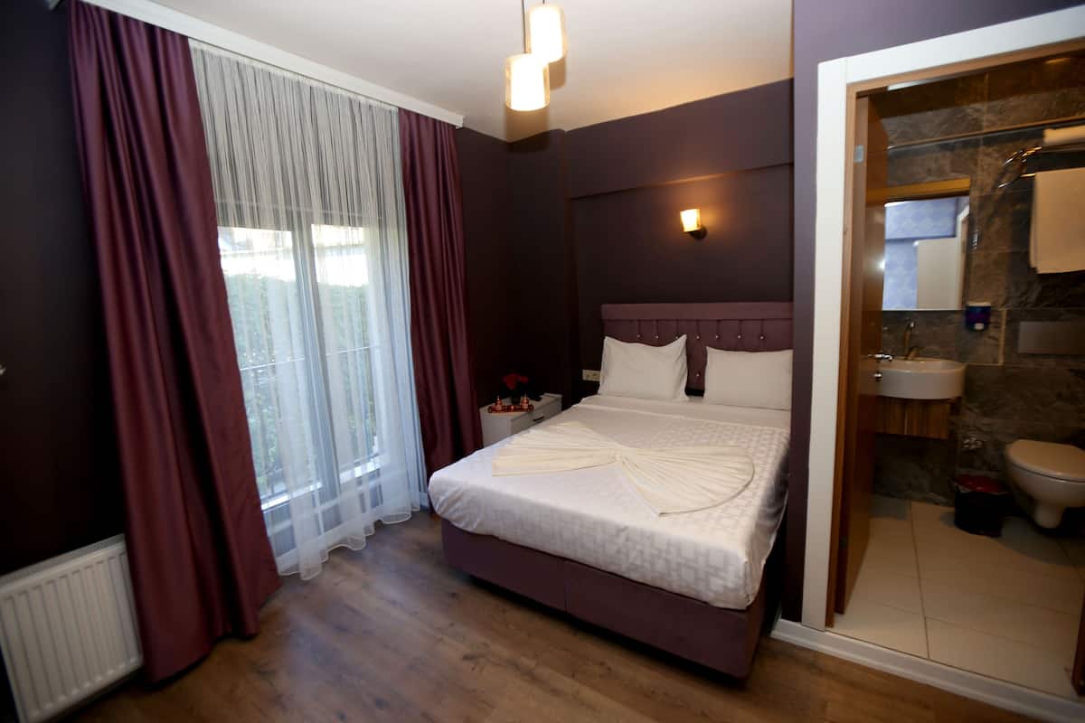 Egyptian cotton sheets, premium bedding, down duvets, memory-foam beds