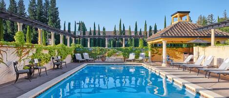 Outdoor pool, open 7:00 AM to 10:00 PM, pool umbrellas, sun loungers