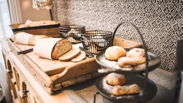 Daily buffet breakfast (EUR 23 per person)