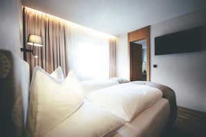 Comfort-Studio (Himmelschluessel) | Daunenbettdecken, Zimmersafe, individuell eingerichtet, Reisekinderbett