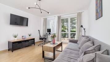 อพาร์ทเมนท์, 1 ห้องนอน, ระเบียง, ริมทะเลสาบ | ห้องนั่งเล่น