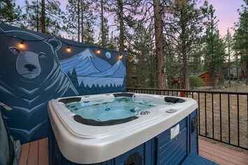 Turn on our outside lights as the sun sinks on the horizon