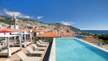 Outdoor pool, pool umbrellas, pool loungers