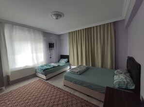 Family Triple Room, Lake View | Desk, laptop workspace, free WiFi, bed sheets - Kaplan Pansiyon (Yesilova)