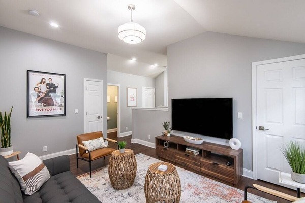 Living room with 65 inch smart TV.