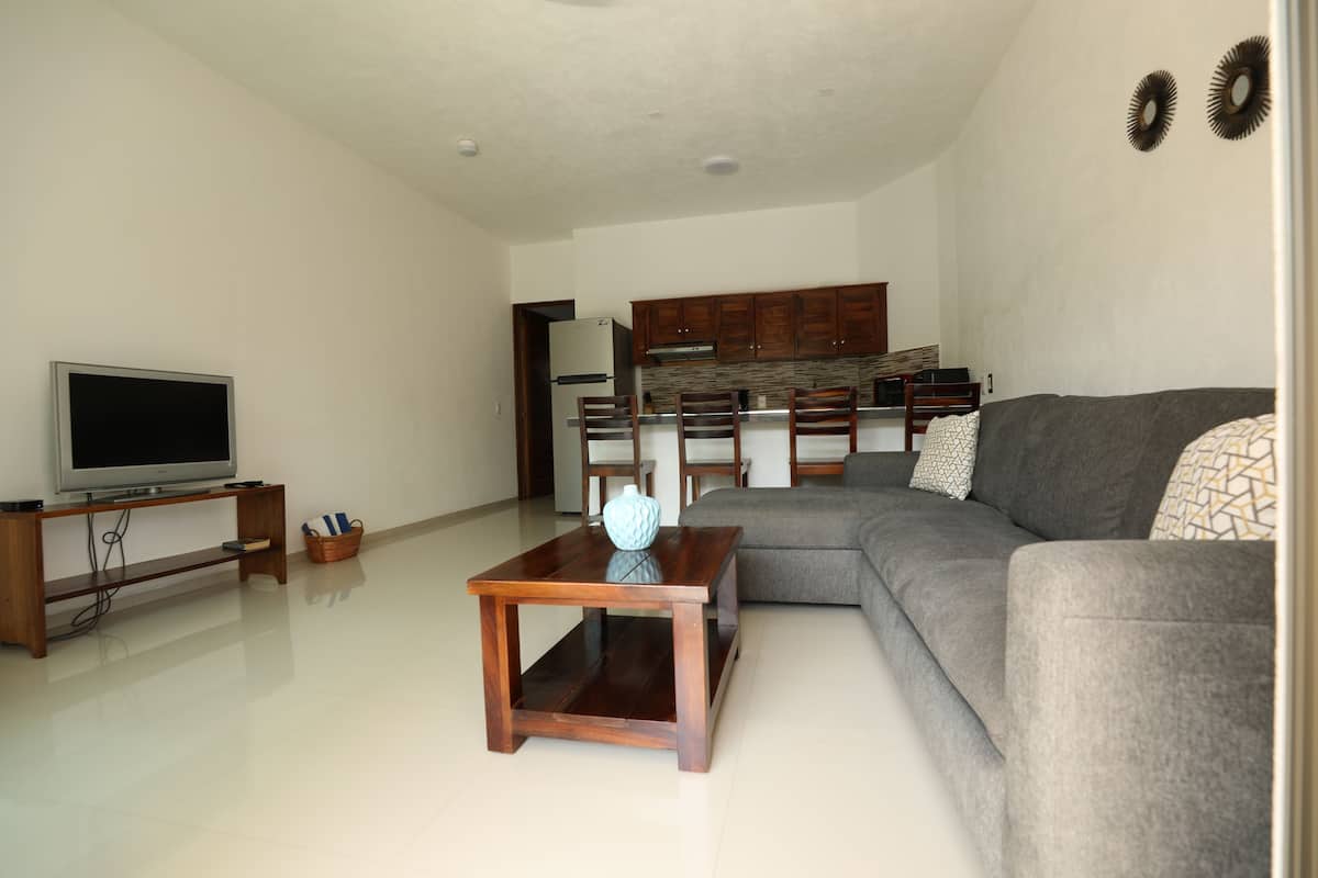 Quarto luxo | Área de estar | TV LED, Netflix, serviços de streaming