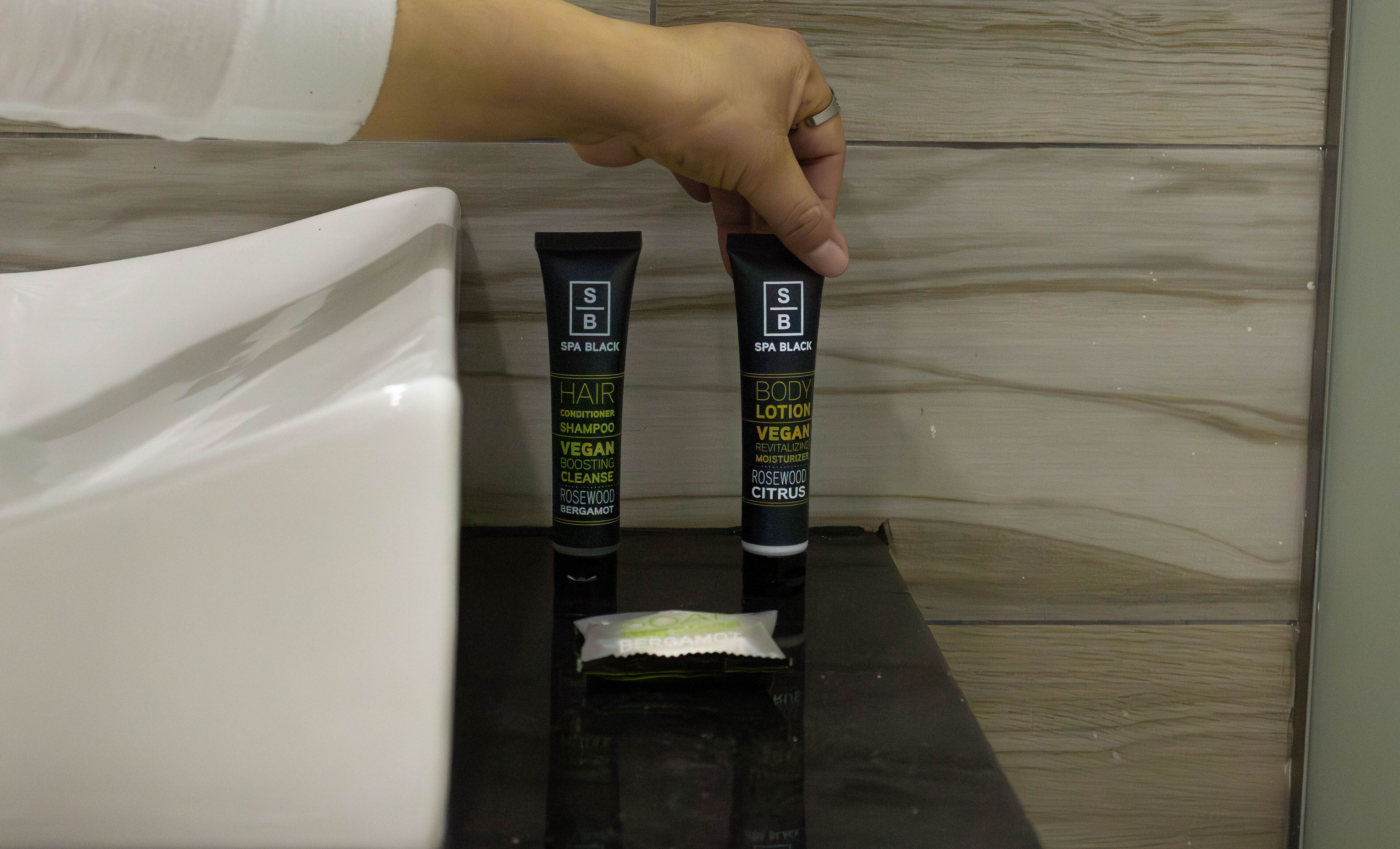 shower, rainfall showerhead, hair dryer, towels