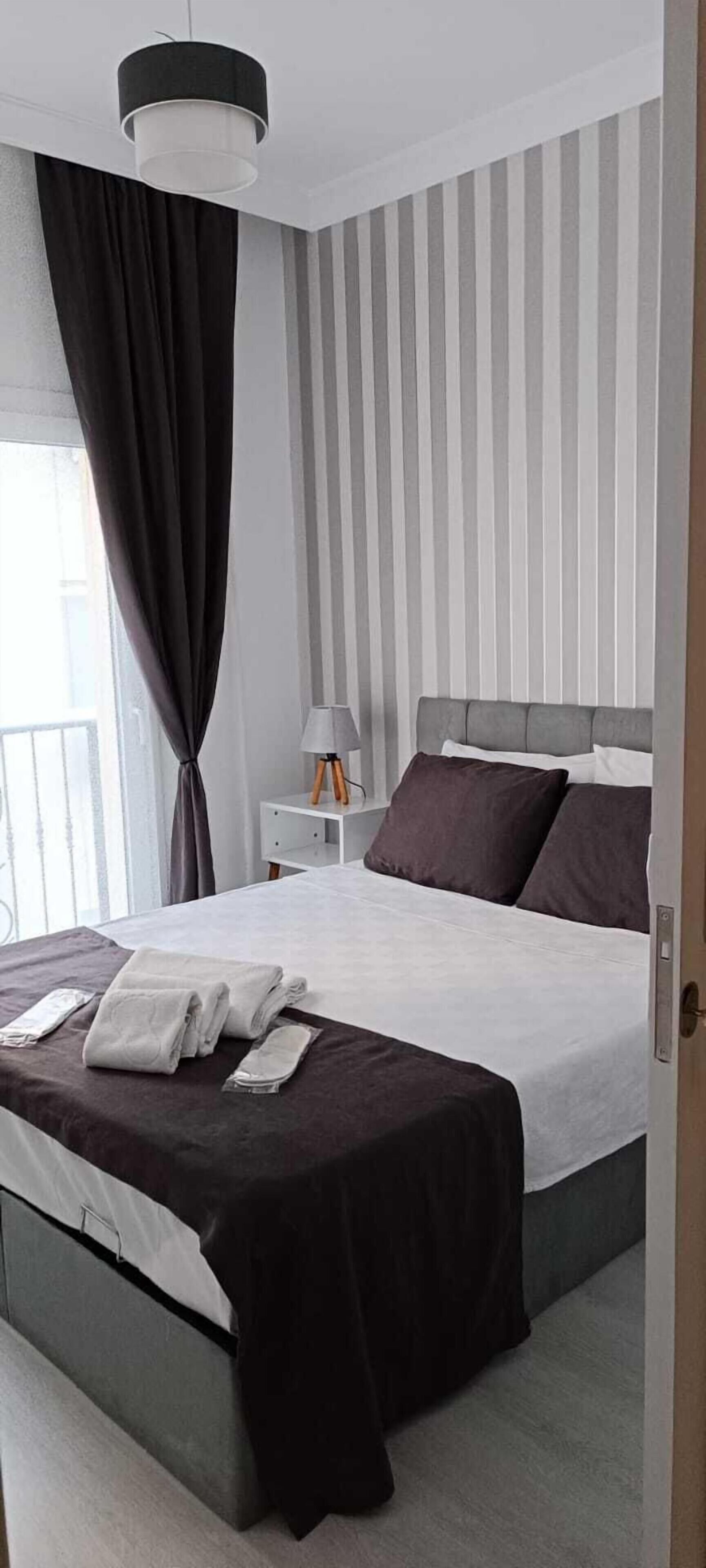 Desk, laptop workspace, free WiFi, bed sheets