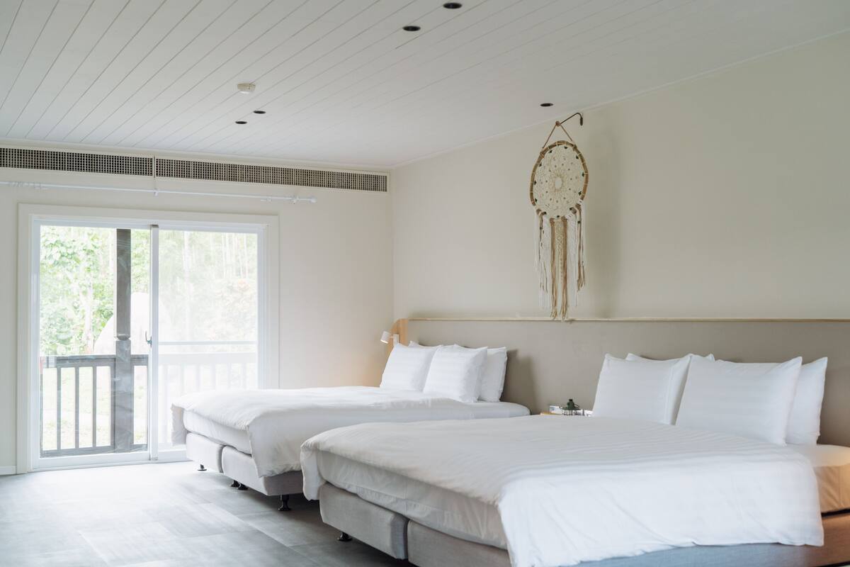Family Double Room, 2 Queen Beds, Bathtub, Courtyard Area | Premium bedding, minibar (free items), in-room safe, cribs (free)