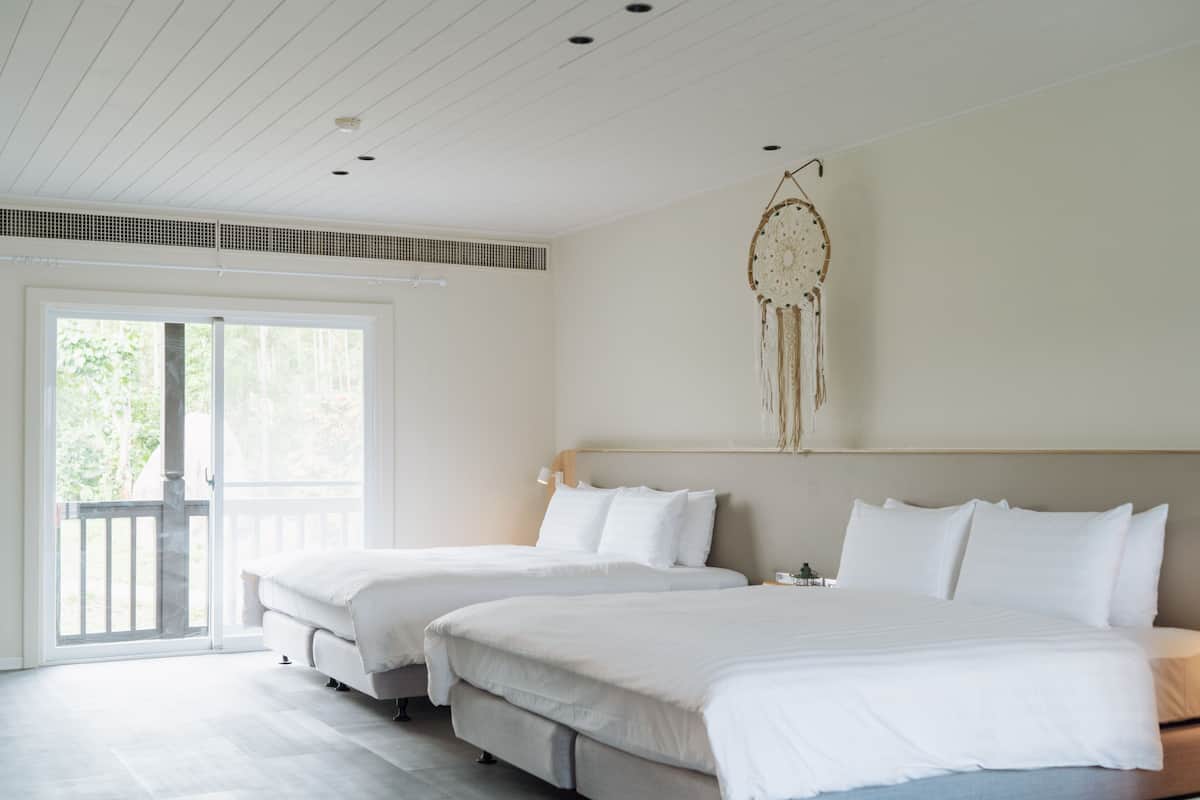Family Double Room, 2 Queen Beds, Bathtub, Courtyard Area | Premium bedding, free minibar, in-room safe, free cots/infant beds