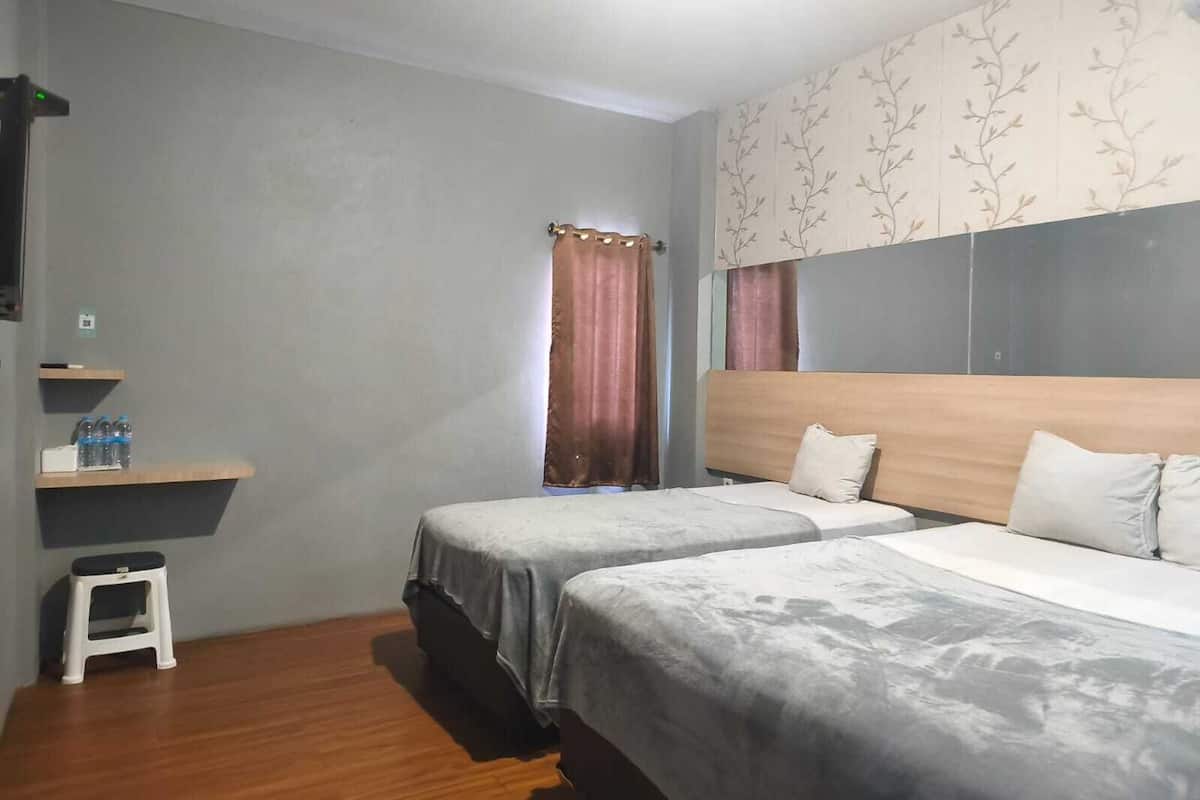 Habitación familiar | Escritorio, wifi gratis y ropa de cama 