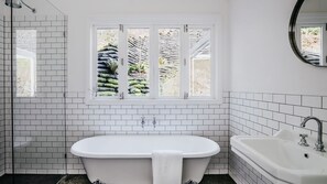Bathtub, hair dryer, towels