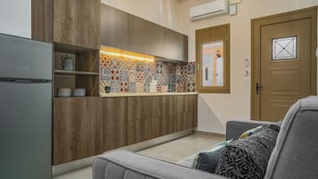 Comfort Apartment | Private kitchen | Full-size fridge, stovetop, cookware/dishes/utensils