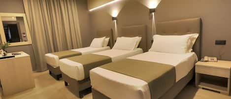 Cubrecamas, colchones con pillow-top y minibar