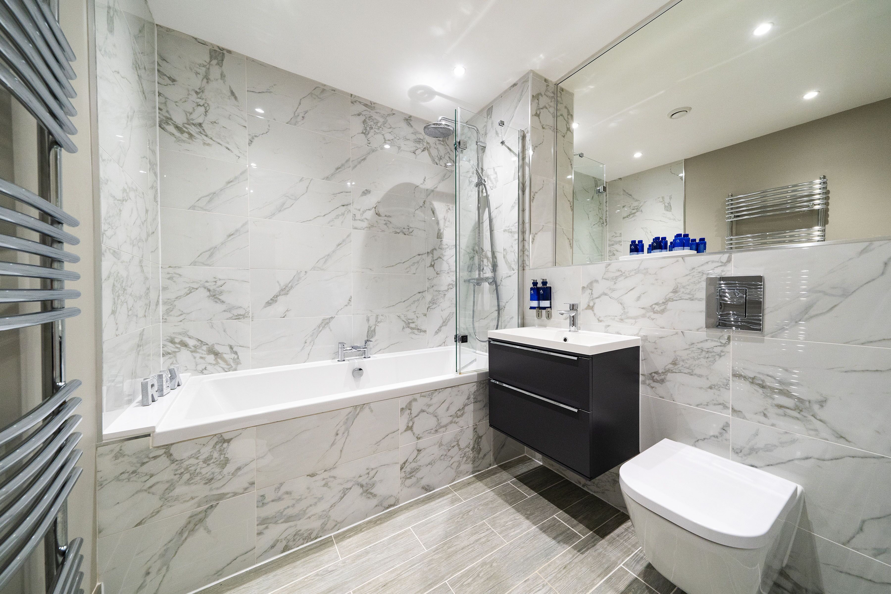 Combined shower/bathtub, hair dryer, towels, soap