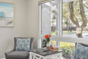 Relax in a comfortable armchair with a view of the surrounding neighborhood.