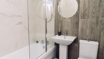 Combined shower/tub