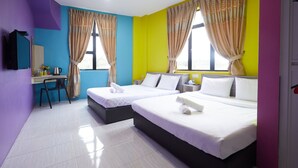 A hotel room with two beds, a desk, and a chair. - Sy Jerantut Hotel (Jerantut)
