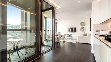 Premium Apartment | Living area | TV