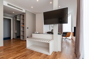 Junior Double or Twin Room | Minibar, in-room safe, desk, laptop workspace