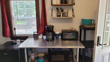 Fridge, microwave, coffee/tea maker, toaster
