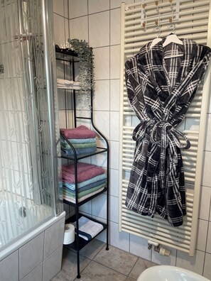 Combined shower/tub, hair dryer, bathrobes, slippers