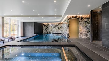 Indoor pool, open 9:00 AM to 9:00 PM, pool loungers