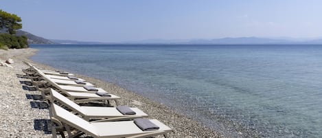 On the beach, black sand