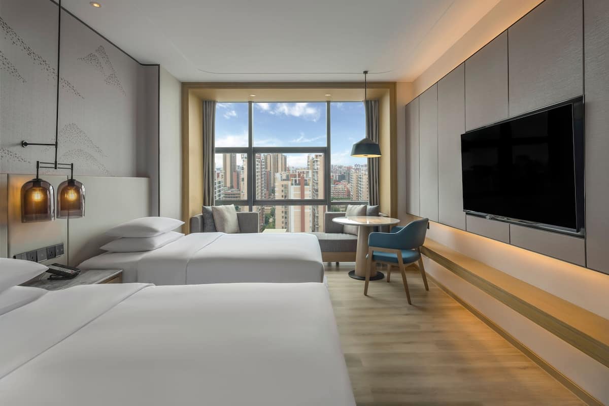 1 slaapkamer, donsdekens, een minibar, een bureau