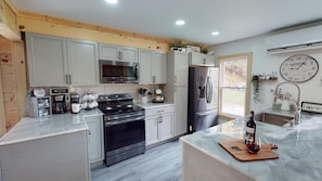 Coffee/tea maker, fridge, microwave, oven