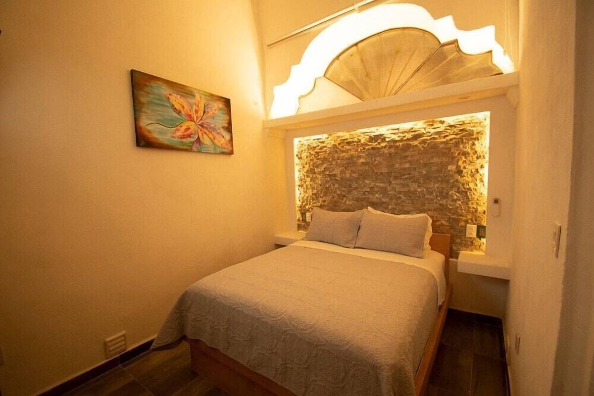 Design kamer | Luxe beddengoed, Select Comfort-bedden, geluiddichte muren, gratis wifi
