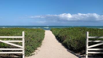 Na praia, toalhas de praia