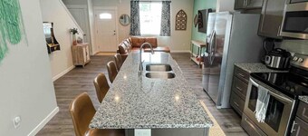 Downtown 3/2, garage, EV Charger, private yard, walk to arena!