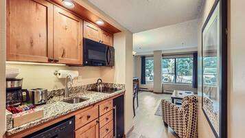 Microwave, stovetop, dishwasher, coffee/tea maker