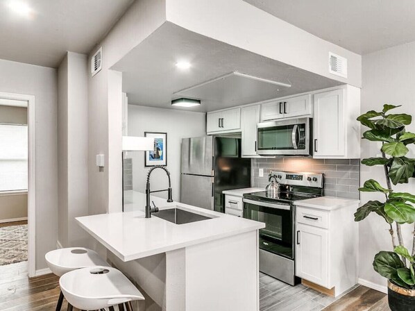Fridge, microwave, oven, stovetop