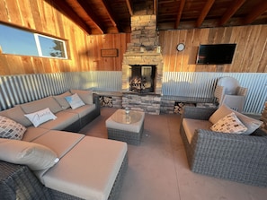 Smart TV, fireplace, DVD player, foosball