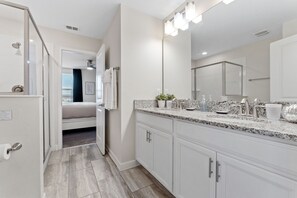 Combined shower/tub, hair dryer, towels, toilet paper